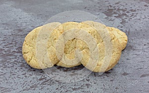 Side view of a group of gluten free Snickerdoodle cookies isolated on gray