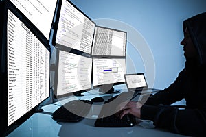 Hacker Using Computers To Steal Data