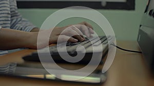 Side view hands of business woman typing on computer keyboard at home. Office desk working online with pc software apps technology