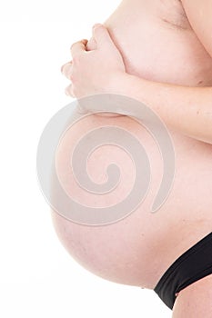 Side view hands mother belly of a pregnant woman Healthy pregnancy concept