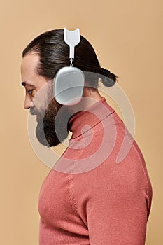 side view, handsome bearded man in