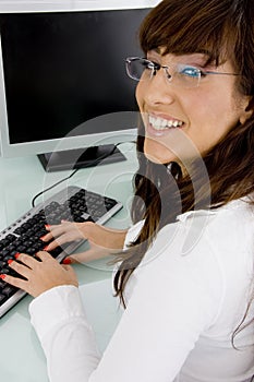 Side view of happy female accountant