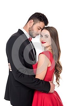 side view of heterosexual couple hugging