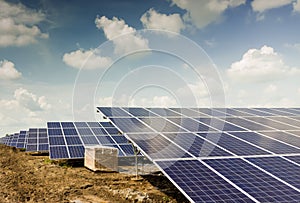 Side view of Installed row of Photovoltaic solar panels / modules at solar power station