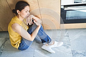 Female suffering from loneliness during the self-isolation photo