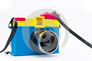 Side view of lomographic diana camera on white background photo