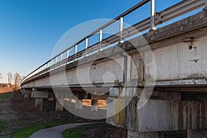 Side View of a Long Road Viaduct Built in Reinforced Concrete with Guard rail