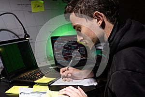 Side view of man planning hacker attack