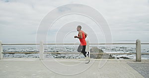 Side view man with prosthetic leg running