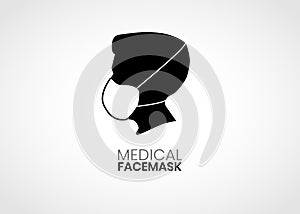 Side view of man wearing medical mask