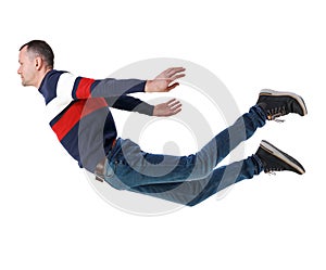 Side view of man in zero gravity or a fall