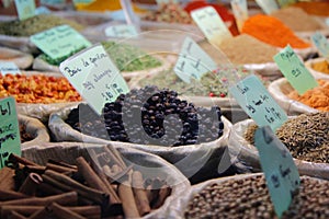 Side view of a market selling spices and seasonings