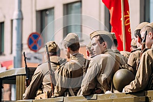 Side View Men In Disguise Soviet Soldiers WW2 Time. Victory Day