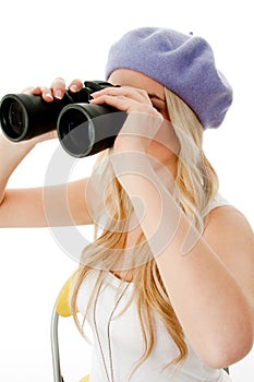 Side view of model looking through binocular