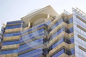 Side view of a modern corporate building with a terrace