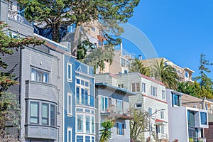 Side view of a neighborhood with rowhouses in San Francisco, CA photo