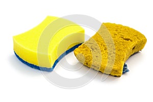 Side view new & old double-side cleaning sponge on white background