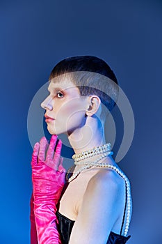 side view, nonbinary person in corset