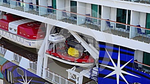 Side view of Norwegian Jewel Cruise Ship from Norwegian Cruise Line with  lifeboats, balcony and deck view close up.