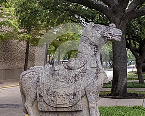 Side view of one of a pair of Chinese Tang Dynasty stone horses outside the World Trade Center in Dallas, Texas