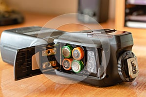 Black used external flash for the camera.