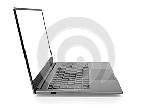 Side view of Open laptop computer. Modern thin edge slim design. Blank white screen display for mockup and gray metal aluminum