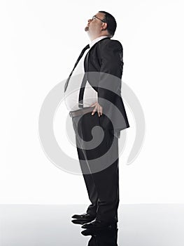 Side View Of Overweight Businessman Standing
