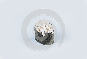 Japanese Gunkan Sushi with Tobiko caviar, rice and snow crab meat wrapped in nori seaweed.