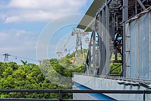 Side view of the part of the bi-cable gondola lift base station.