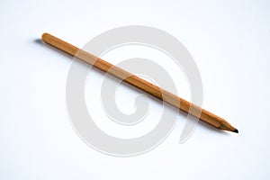 Side view that photographed a wooden pencil on a white background