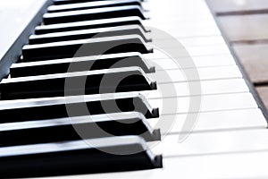 Side view of piano keys. Close-up of piano keys. Close frontal view. Piano keyboard with selective focus. Diagonal view. Piano key