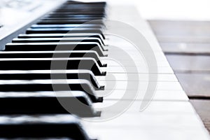 Side view of piano keys. Close-up of piano keys. Close frontal view. Piano keyboard with selective focus. Diagonal view. Piano key