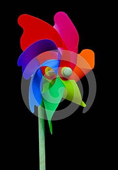 Side view of a pinwheel on black background