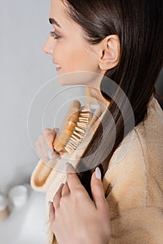 side view of pleased young woman