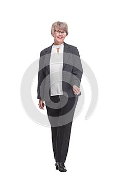 Side view portrait of attractive businesswoman of middle age woman standing with arms crossed