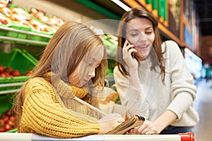 Little Girl Writing Shopping List