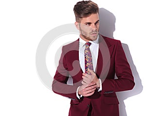 Side view of a businessman holding his palms togther photo