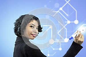 Side view portrait of smiling businesswoman writing of visual screen