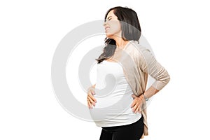 Side view of a pregnant woman with lower back pain