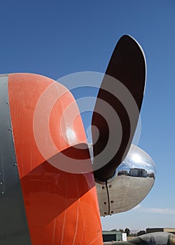 Side view of a propeller on antique airplane