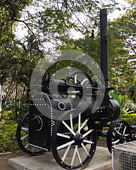 Side view of Ransome-s old steam engine isolated in district Science Centre Kalaburagi