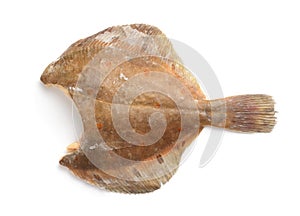 Side view of raw frozen headless flounder fish