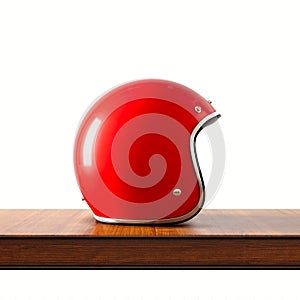 Side view of red color vintage style motorcycle helmet on natural wooden desk.Concept classic object isolated at white