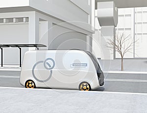 Side view of self-driving delivery van stopping in the street