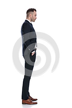 Side view of serious businessman looking forward