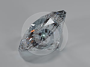 Side view of a shining diamond on a gray background