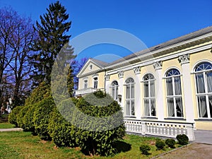 Side view shot of the hotel wall and bushes next to it in Spa Park, Jelenia GÃ³ra, Poland.