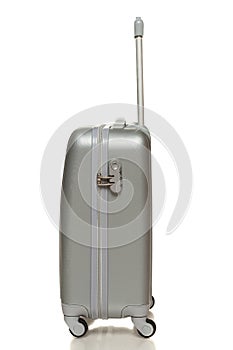 Side view of silver travel suitcase