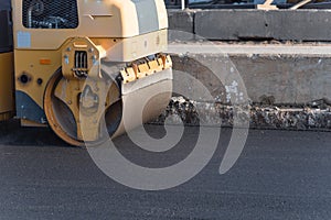 Working ride on roller asphalt compactor