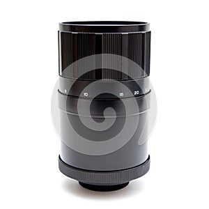 Side view of a soviet era mirror tele lens. Macro studio shot on white background